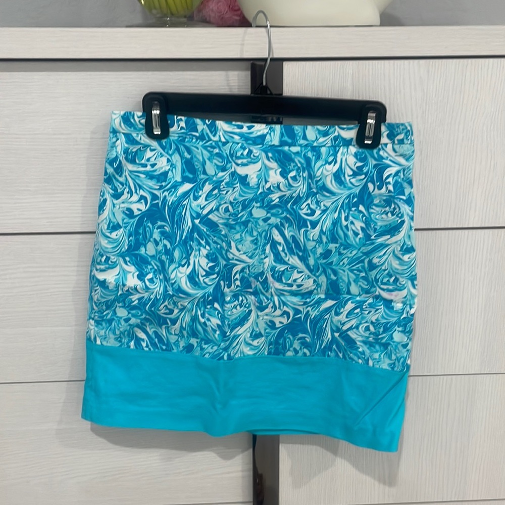 Michael Kors skirt, which you can use for any events.